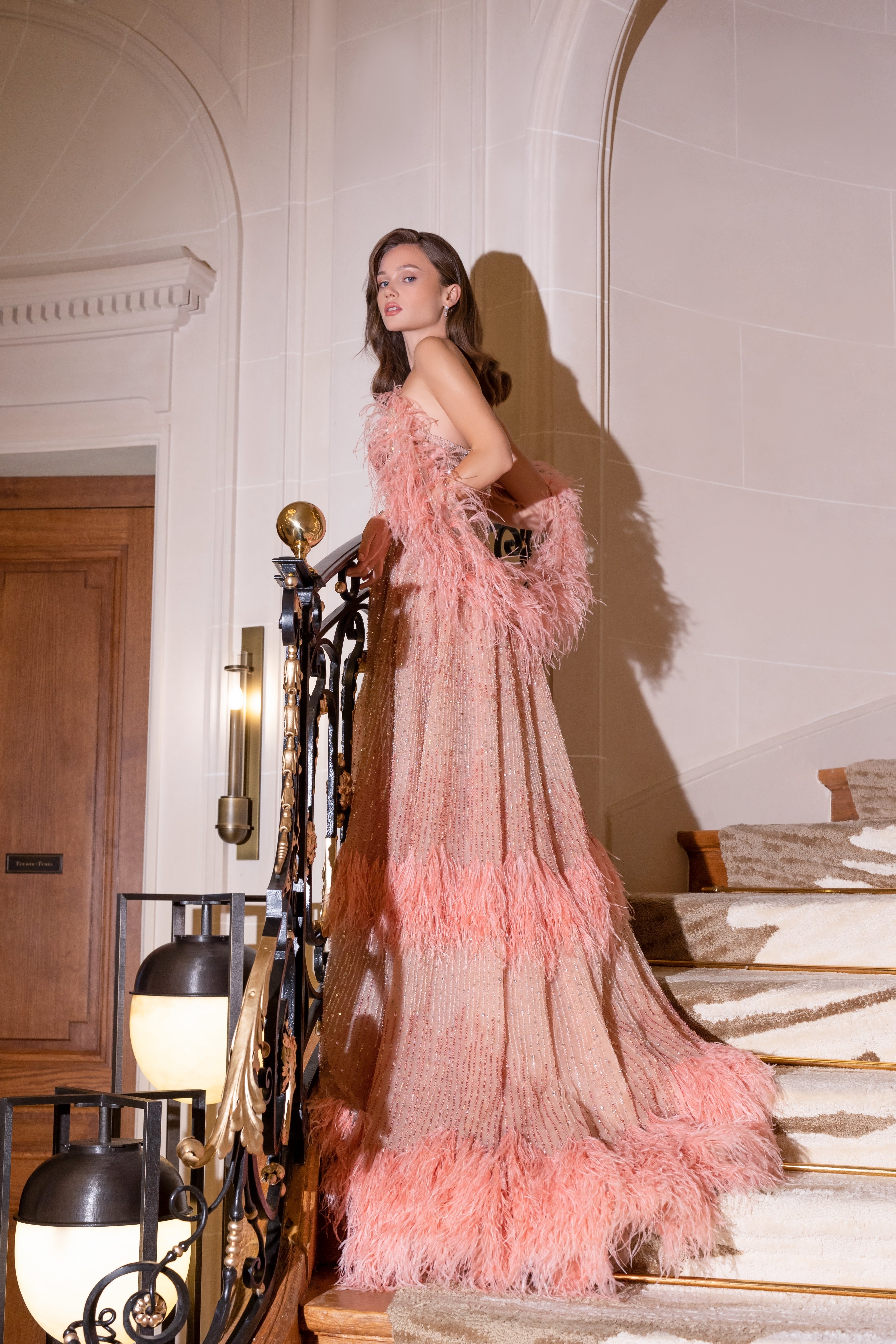 Feathered evening dress with a stunning design inspired by flowers and nature